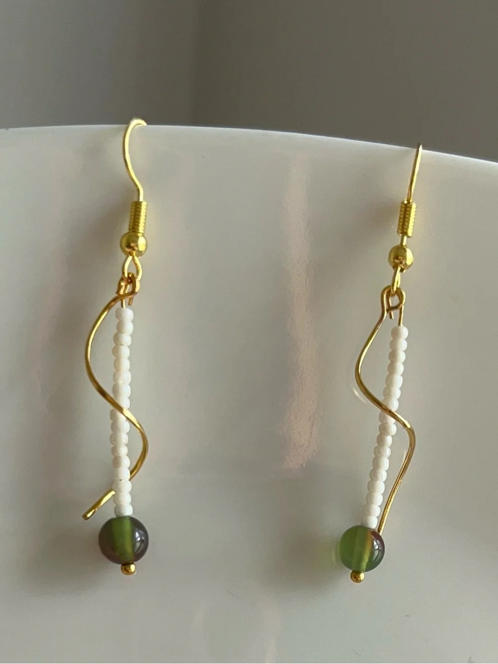 Dainty Drop Gold-toned Wavy Metal Design Adorned | White & Olive Grean Jade Bead